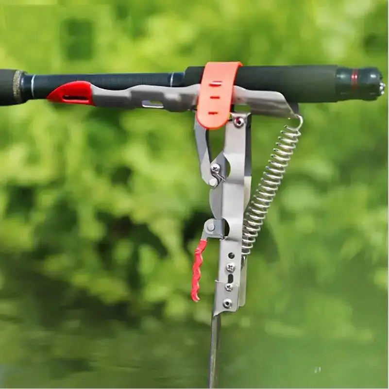 Automatic fishing rod holder securely holding a fishing rod, ideal for hands-free fishing