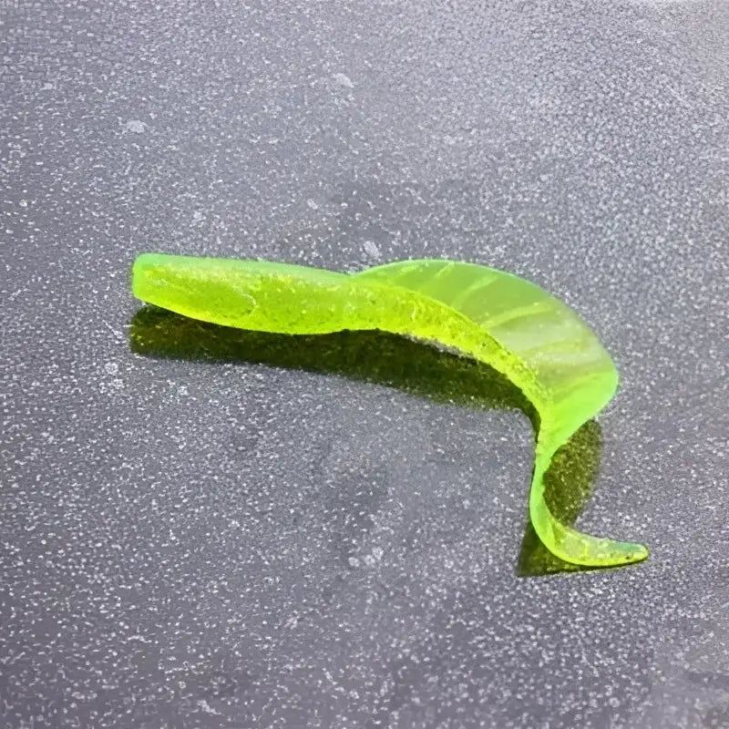 Bright green soft bait for bass fishing designed for effective attraction in water