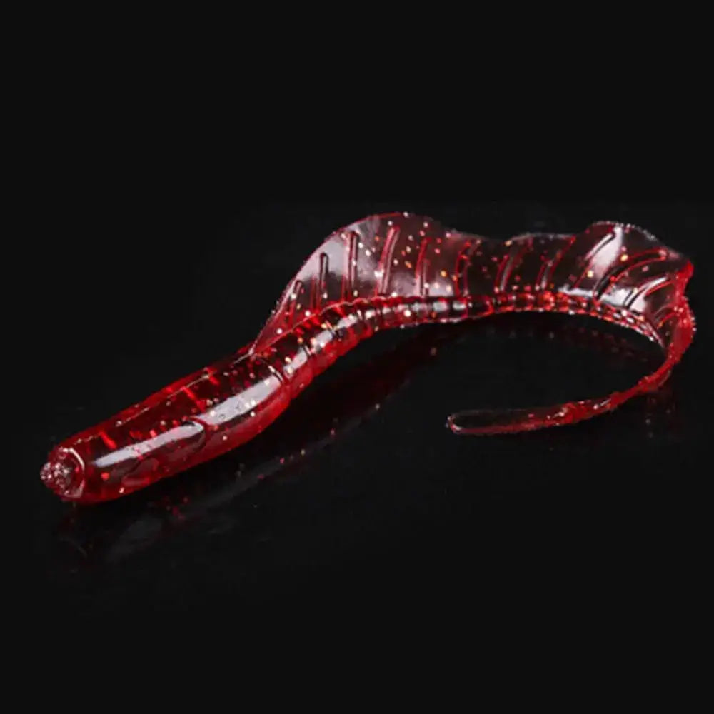Translucent red soft bait for bass fishing with streamlined design and glitter finish