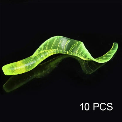 Translucent, yellow, worm-shaped fishing lure.