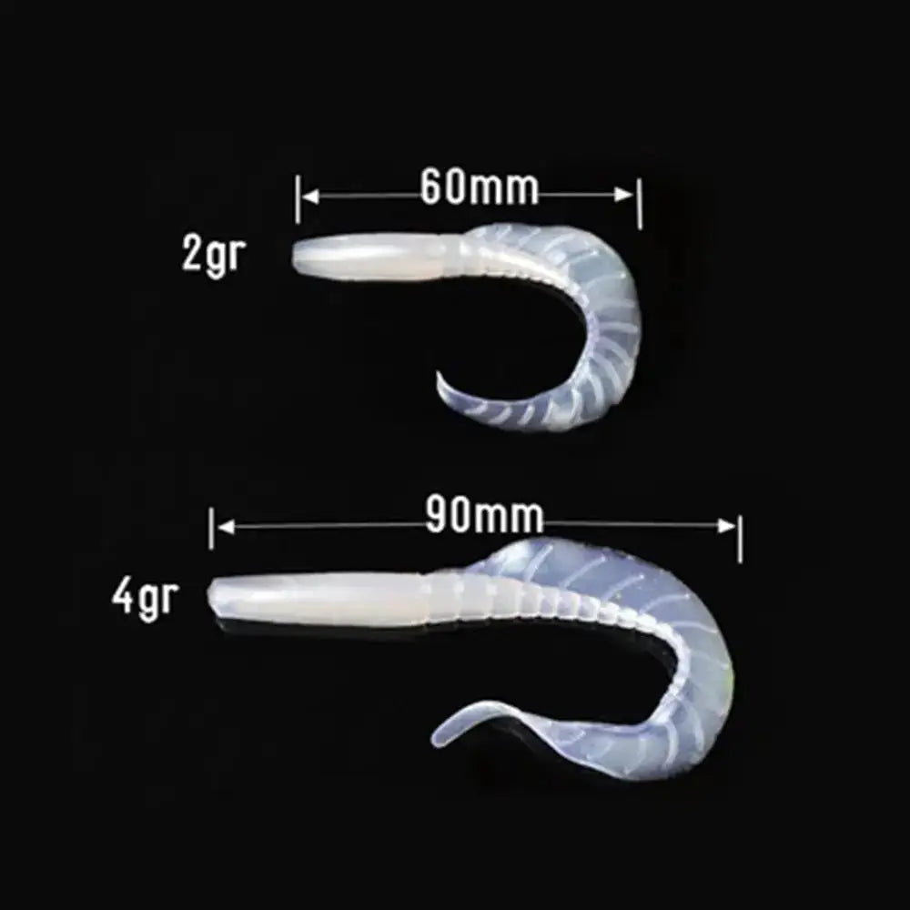 Two translucent, curved fishing lures with size and weight markings.