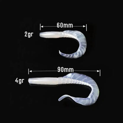 Two translucent, curved fishing lures with size and weight markings.