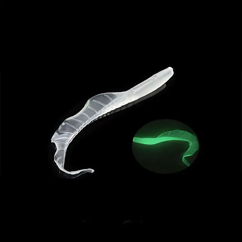 Translucent, segmented, glow-in-the-dark fishing lure.