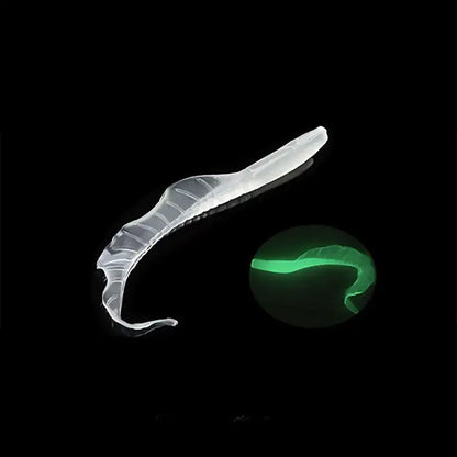 Translucent, segmented, glow-in-the-dark fishing lure.