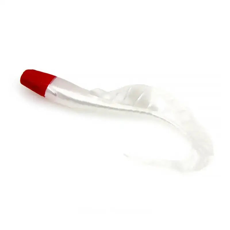 White soft plastic fishing lure with red tip.