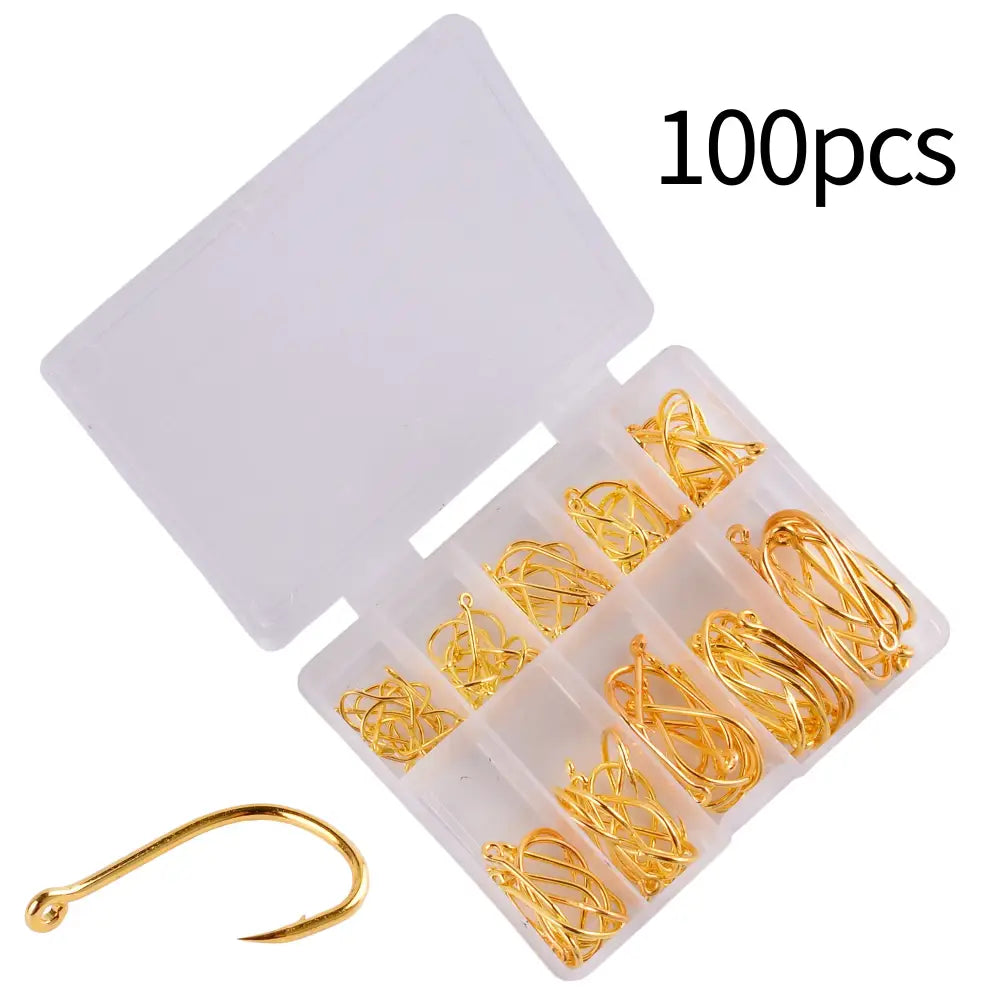 Gold fishing hooks in a plastic container.