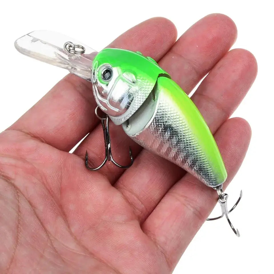 Green and silver fishing lure.