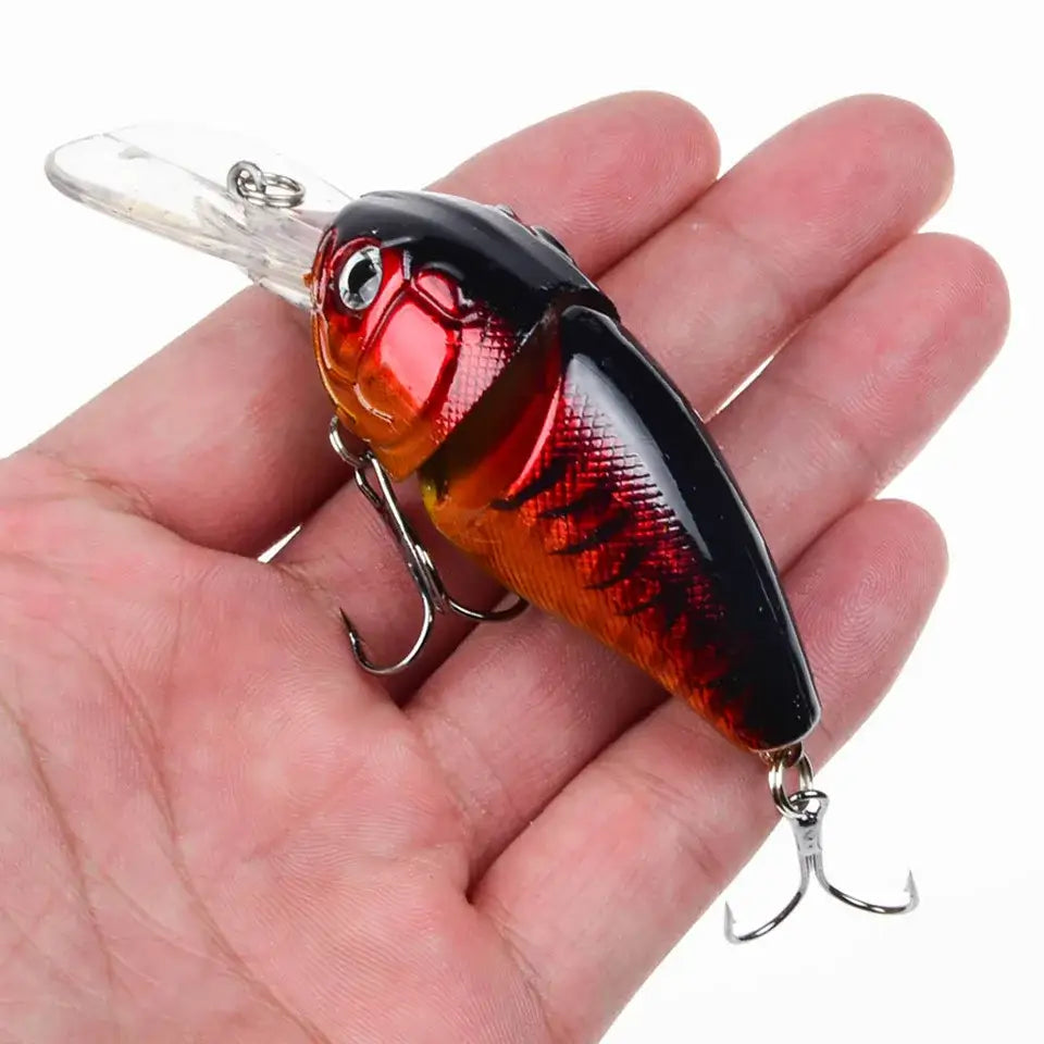 Red and black fishing lure with hooks.