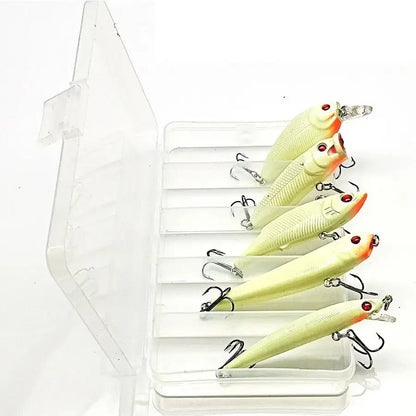 Fishing lures in a clear plastic box.