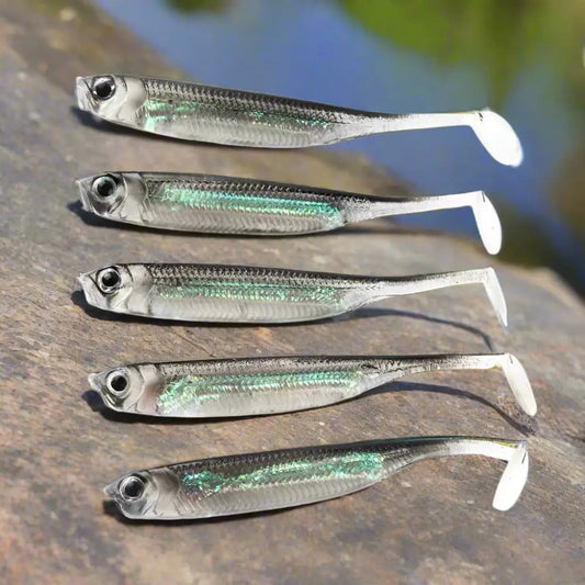 Five silver paddle-tail fishing lures.