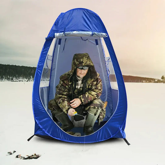 Blue ice fishing tent with occupant.