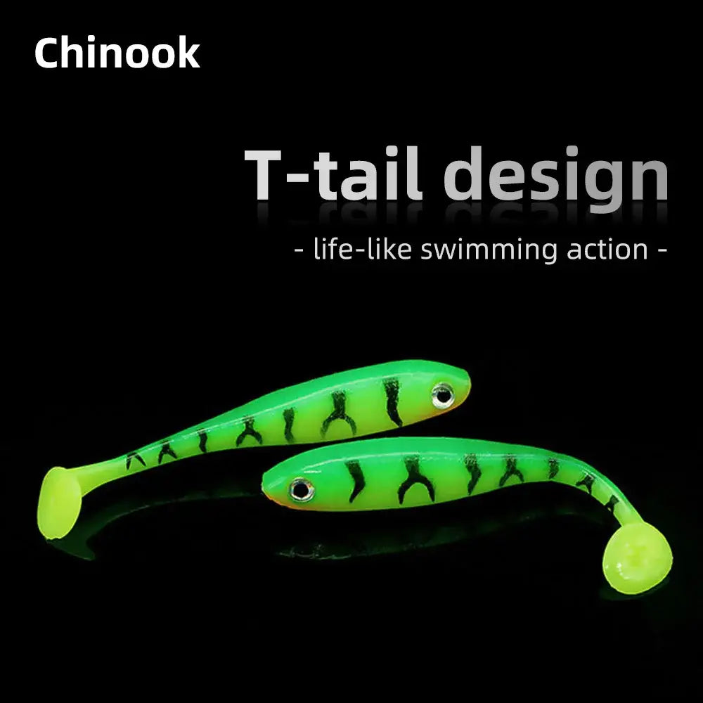 Two green and black T-tail fishing lures.