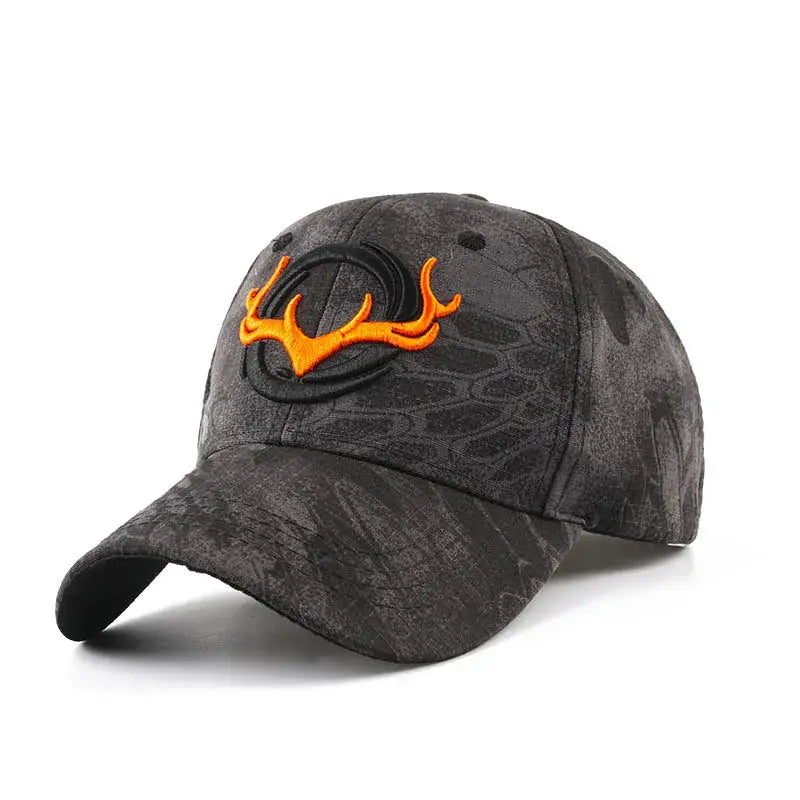 Black tactical baseball cap with orange embroidered deer antlers. A rugged and stylish choice for outdoor adventures and fishing trips.