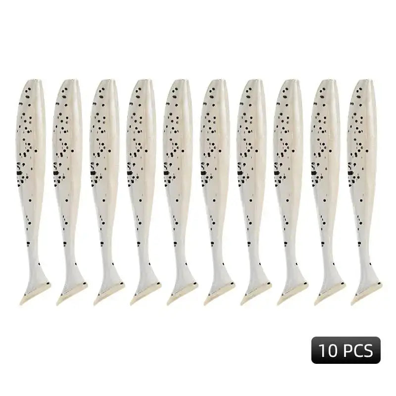 Ten white fishing lures with black spots.