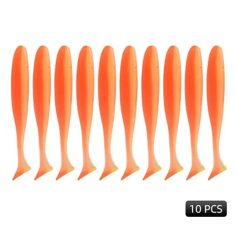 Ten orange fishing lures.