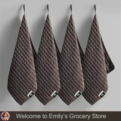 Four brown waffle-textured towels.