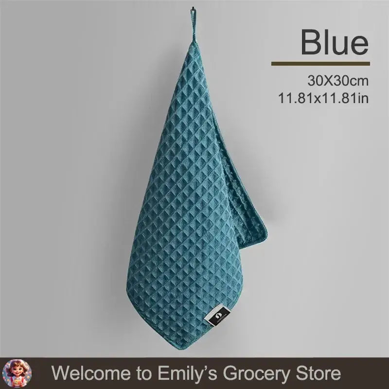 Blue waffle-textured hand towel.