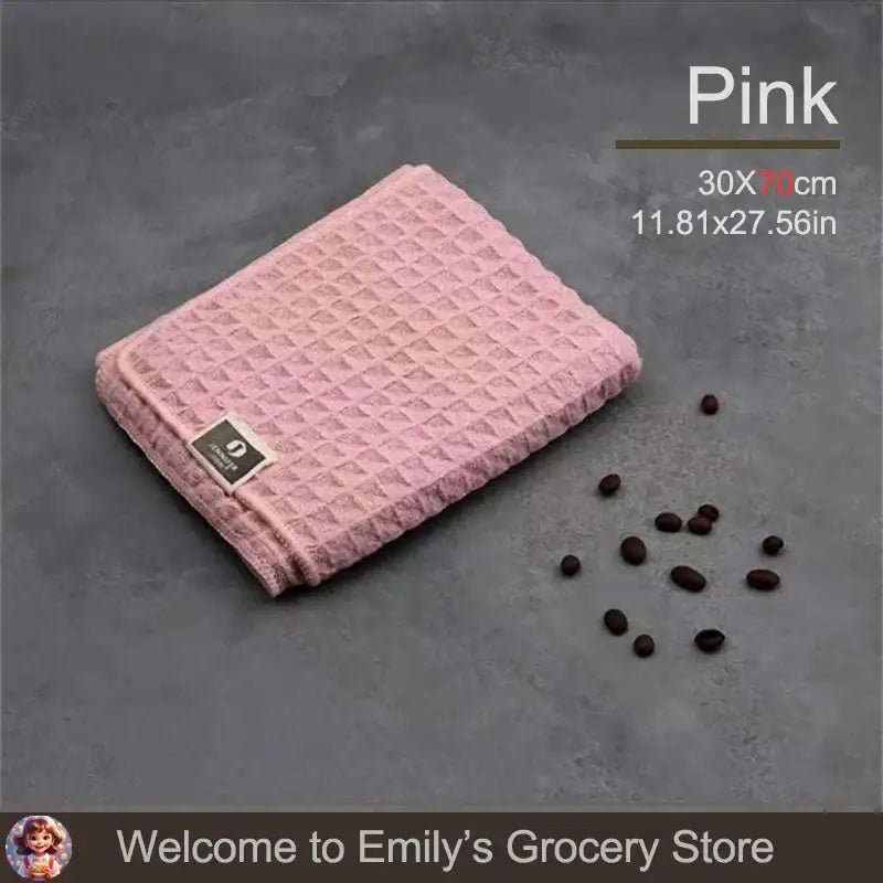 Pink waffle-textured towel.