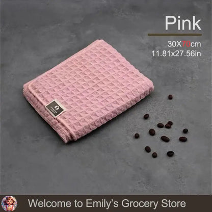 Pink waffle-textured towel.