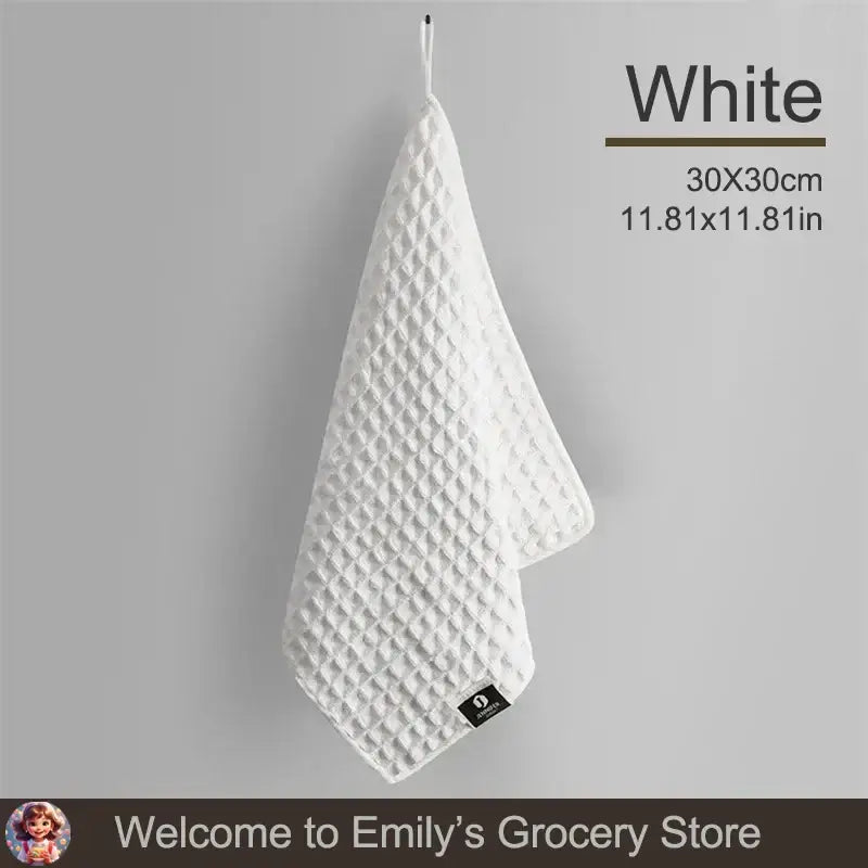 White waffle-textured hand towel.