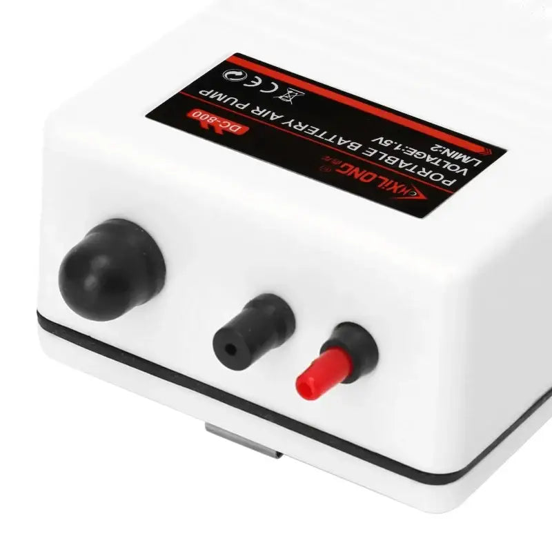 White portable battery air pump.