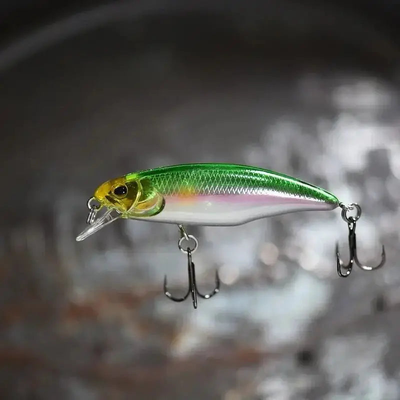 Green and silver fishing lure.