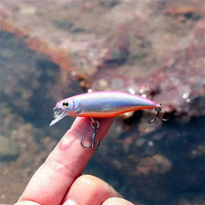 Pink and silver fishing lure.