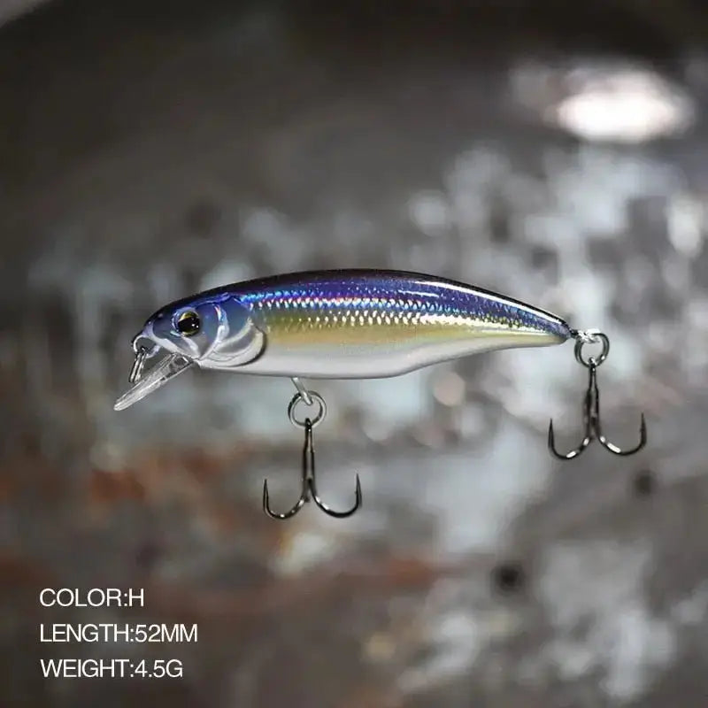 Fishing lure with two treble hooks.